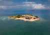 De la NBA al paraíso: exjugador compra isla privada en Belice y la convierte en un lujoso destino turístico