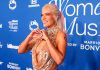Karol G recibirá el Premio a la Excelencia como Artista Internacional en los American Music Awards