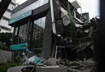 Institución financiera Bancaribe llama a la calma y aclara que trabajos en Altamira es una demölición controlada